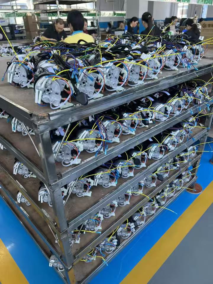 Wired appliance assemblies stored on production racks